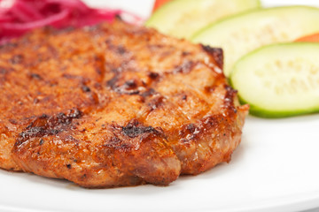 barbecue with sauce and vegetables
