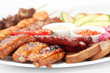 barbecue with sauce and vegetables