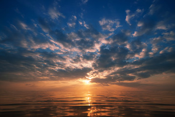 Obraz na płótnie Canvas Sunset on the beach with beautiful sky