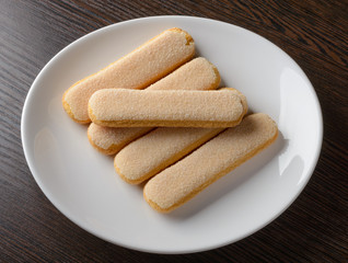 Five tasty savoyards in a white porcelain plate