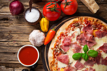 Delicious italian pizza served on wooden table