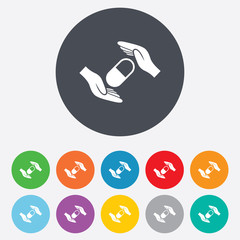 Medical insurance sign. Hand holds pill.