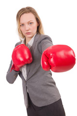 Woman businesswoman with boxing gloves on white