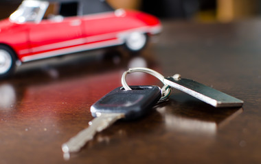 Car key on a wooden table