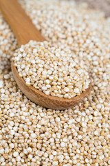 quinoa in a wooden spoon