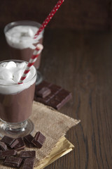 Hot chocolate in glass with whipped cream
