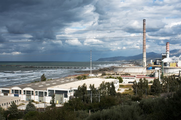 Obraz premium smokestacks near the coast