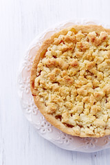 Shortcrust apple tart with coconut crumble