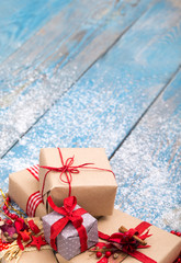 christmas ornament in snow on wood background. studio shot
