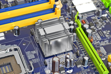 Printed computer motherboard with microcircuit, close up, DOF