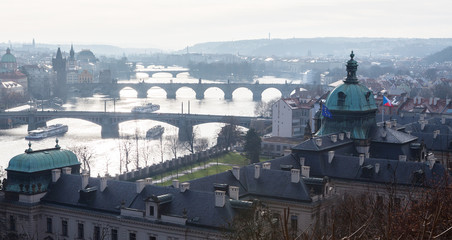 Fototapeta na wymiar Prague - view with Vltava River, Charles Bridge and bridges
