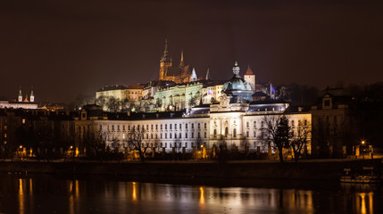 Fototapeta na wymiar The night View on bright Prague with St. Vitus Cathedral
