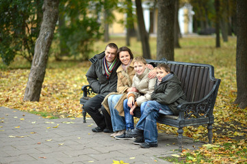 Family of four sitting