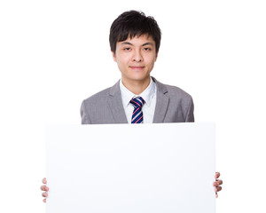 Businessman hold with white board