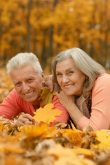 Mature couple in the autumn park