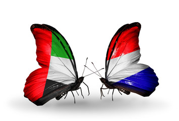 Two butterflies with flags UAE and Holland