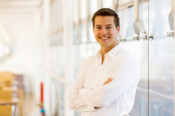 young man with arms crossed