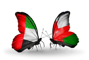 Two butterflies with flags  UAE and Oman