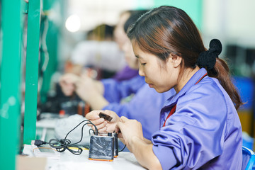 chinese female worker at manufacturing