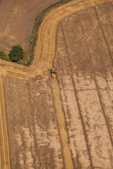 erial view of combine on harvest field