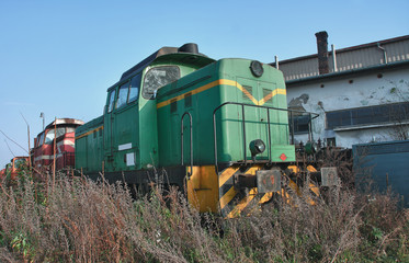 Old abandoned  trains at  depot in sunny day