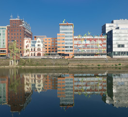 Fototapeta na wymiar modern office buildings reflected