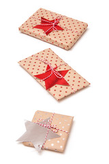 Obraz premium Gift wraped parcels or presents isolated on a white studio backg