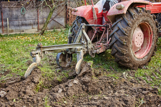 Tractor plowing the land
