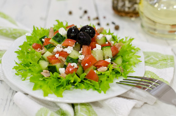 Fresh salad with tuna, tomatoes and cucumbers