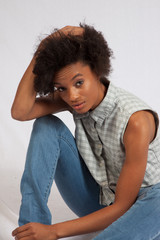 Black woman looking thoughtful