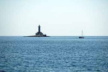 Old lighthouse on a rock island