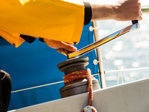 Winch capstan with rope on sailing boat.