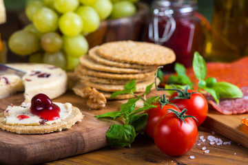 traditional english soft cheese with cranberry sauce