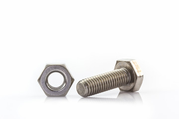Metal screw and nuts on white background.