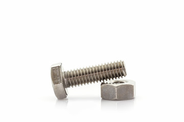 Metal screw and nuts on white background.