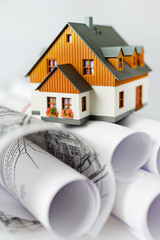 new model house on architecture blueprint plan at desk