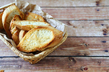 roasted baguette slices in a basket​​