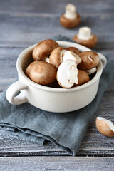Fresh mushrooms in a ceramic bowl
