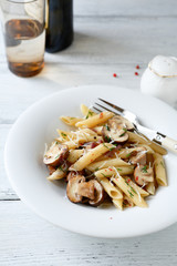 Pasta with pieces of mushrooms and cheese