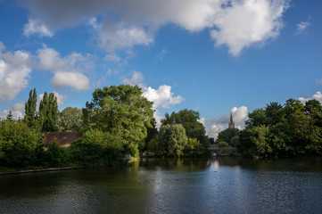 Fototapeta na wymiar Bruges lake and park under a sunny sky.