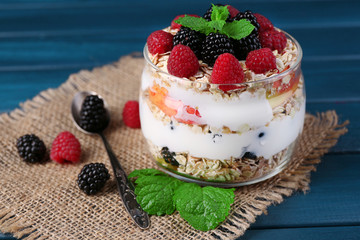 Healthy breakfast - yogurt with  fresh fruit, berries and
