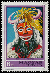 Fototapeta premium Stamp printed by Hungary shows Mask