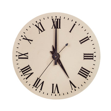 Vintage clock face showing five o'clock
