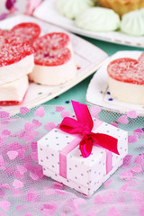 Cute gift on birthday table close-up