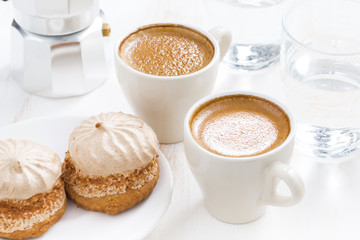 cup of fresh espresso and cakes for breakfast, top view