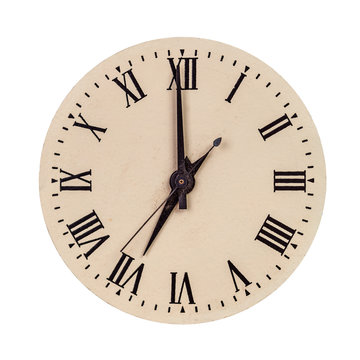 Vintage clock face showing seven o'clock