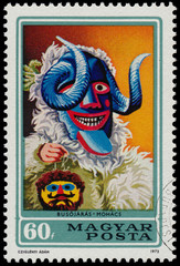 Fototapeta premium Stamp printed by Hungary shows Mask