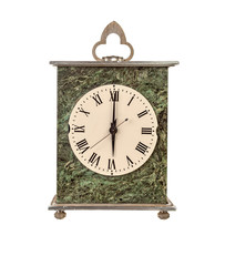Mantel clock showing six o'clock