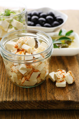 Feta cheese on table