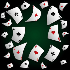 aces of different cards on a black background